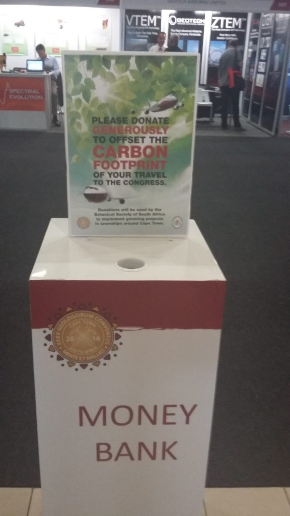 Donation box for offsetting travel carbon footprints. 