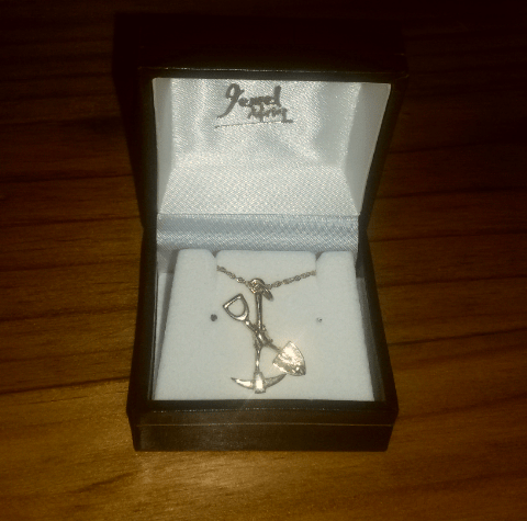 A gold mining themed necklace, a present from my good friends Nia and Patrick. 