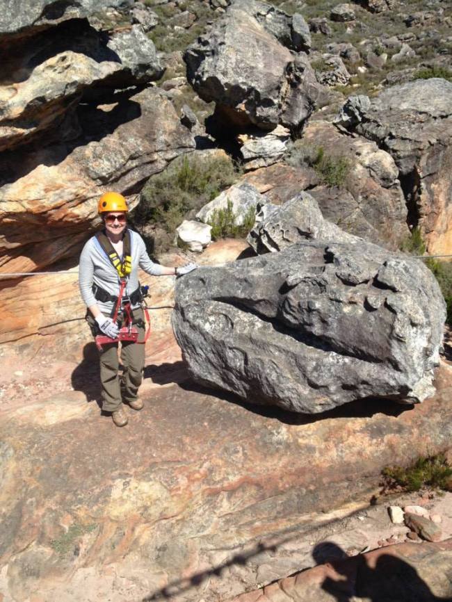 Posing with an interesting rock that is supposed to resemble a T-Rex head. 