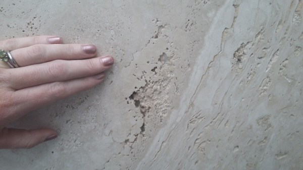 A very pretty travertine tile. I love the layering and the void spaces. 